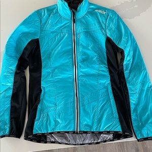 Swix lightweight jacket. Great for Snowshoeing, XC skiing or spring skiing.